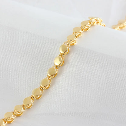 Golden Grace – Ronde Halsketting met Subtiele Kruisrand